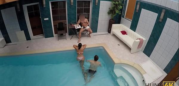  HUNT4K. Slim brunette has sex with stranger by the pool near her man